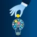 A blue-toned illustration depicts a hand placing a coin into a light bulb filled with gears and mechanical parts. The light bulb symbolizes ideas and innovation, while the coin represents venture capital investment. The background is a gradient of dark blue. | COYYN