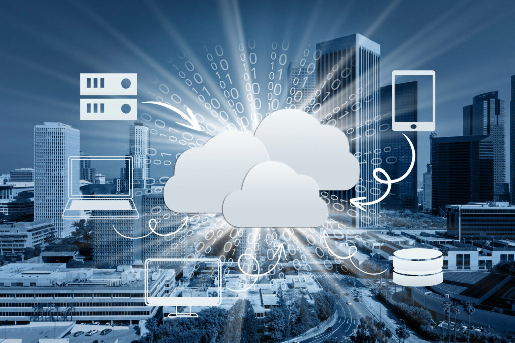 A digital illustration of a cityscape with skyscrapers. Overlaid on the image is a concept of cloud computing, featuring cloud icons connected to devices like a laptop, smartphone, and server, symbolizing data transfer and technological connectivity. | COYYN