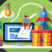 An illustration of a person sitting on a desk with a computer displaying "Level Up." Nearby are stacks of gold coins, a rocket, a money bag icon, and plants. The theme suggests financial growth and ambition. | COYYN.com Gig Economy Platforms