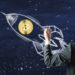 A man in a suit draws a white chalk rocket on a dark blue chalkboard, with a gold Bitcoin symbol placed inside the rocket, symbolizing cryptocurrency growth. | COYYN