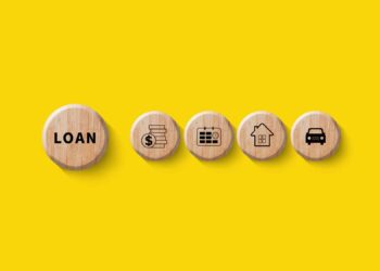 Five wooden circles on a yellow background, with icons representing "loan," money, a calendar, a house, and a car, symbolizing different types of loans and financial concepts. | COYYN